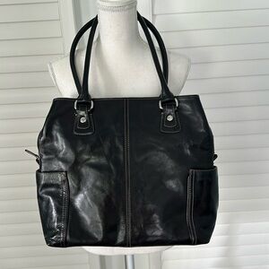 Fossil genuine leather black tote bag briefcase with a lightly padded interior